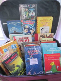Leseförderung - Bücherkoffer mit Bücherspenden